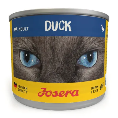Josera Adult Duck krmivo pro kočky, německá kvalita, bez obilovin. Obal zobrazuje modré kočičí oči a symbol kachny.