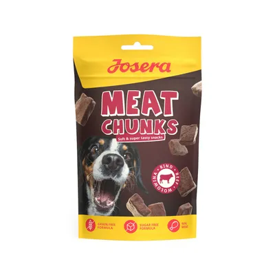 Josera MEAT CHUNKS, snacks tendres pour chien, bœuf. Texte visible : Grain free formula, Sugar free formula, 90% meat. Illustration de morceaux et tête de chien.