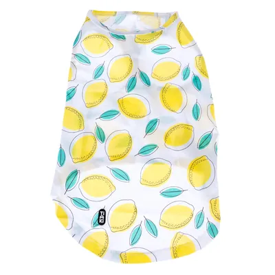 Vêtement pour animal blanc avec motifs citrons jaunes et feuilles vertes, étiquette visible avec texte 'TIAKI' en bas à gauche.