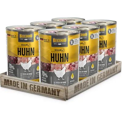 Belcando Dog Food Baseline kurczak, wyprodukowane w Niemczech, 70% mięsa i podrobów, bogate w kurczaka, z olejem z ostu. Opakowanie przedstawia kilka puszek na drewnianej tacy z napisem 'Made in Germany'.