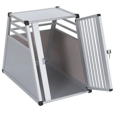 Transportbur i aluminium med gallerdörr, sidoventilationsspringor och låsbart lås. Lämplig för säker transport av husdjur.