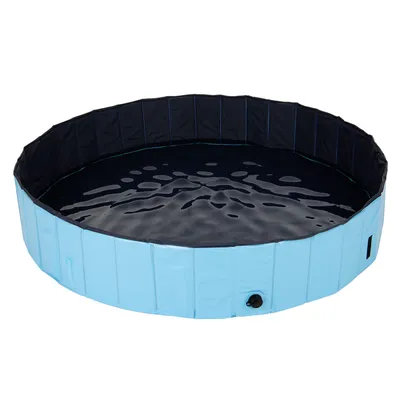 Piscina redonda y azul plegable con llenado de agua, apta para mascotas. Válvula de vaciado visible en el lateral.