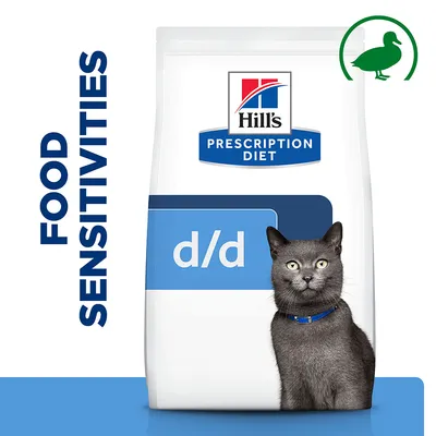 Prescription diet food for food sensitivities, d/d formula with duck protein indicated, packaging shown with a cat beside the bag.