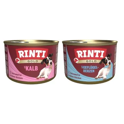 Twee blikken Rinti Gold hondenvoer: één met tekst 'Kalb', één met tekst 'Geflügelherzen'. Beide tonen een hond en vermelden 'Graanvrij, fijne stukjes'.
