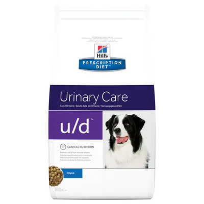 Hill's Prescription Diet Urinary Care u/d Original hundfoder, bild på svartvit hund och foderkulor. Text: Clinical Nutrition, reduces risk of non-struvite stones.