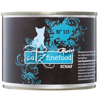 Lata de comida para gatos Catz finefood Purrrr N° 113 Schaf. Etiqueta negra con detalles azules, silueta de gato y texto en alemán visible.