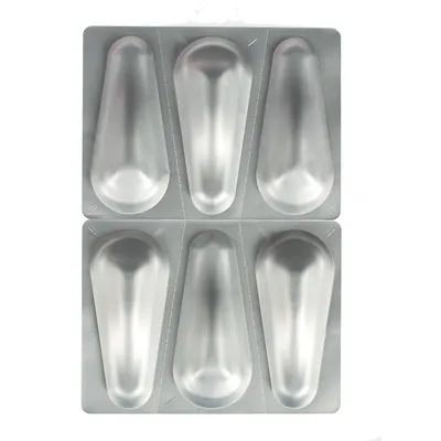 Plaquette de 6 unités en aluminium, chaque unité est une capsule allongée sous blister transparent, sans texte ni marque visible.