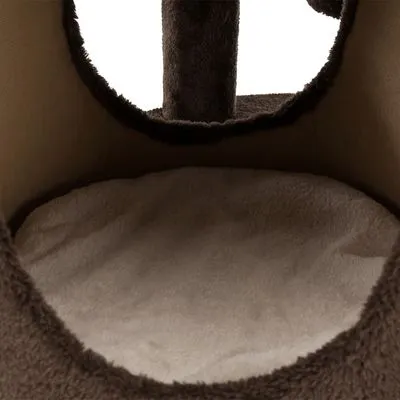 Interior de uma casota ou toca para gatos, com almofada redonda branca e estrutura revestida a tecido castanho.