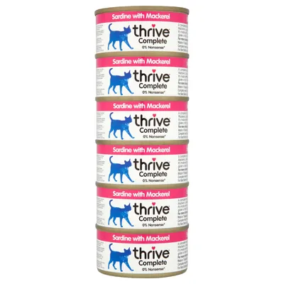 Stack of six tins labelled 'Sardine with Mackerel', 'thrive Complete', and '0% Nonsense*'. Each tin shows a blue animal silhouette. Product details are printed on the side.