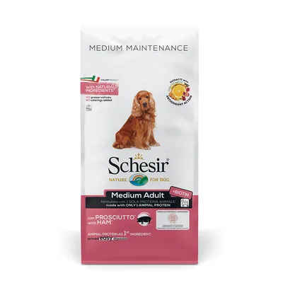 Schesir Nature for Dog Medium Adult med skinka, biotin, naturliga ingredienser, inga konserveringsmedel eller färgämnen, animaliskt protein som första ingrediens. Bild på hund på förpackningen. Schesir Nature for Dog Medium Adult med skinka, biotin, naturliga ingredienser, inga konserveringsmedel eller färgämnen, animaliskt protein som första ingrediens. Bild på hund på förpackningen.