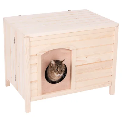 Meuble en bois clair avec ouverture ronde, chat tigré visible à l’intérieur. Convient pour cacher une litière ou offrir un abri au chat. Matériau : bois.