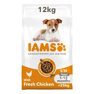 12kg bag of IAMS dry food with fresh chicken, for small and medium puppies aged 1-12 months under 25kg, labelled 100% complete and balanced nutrition.