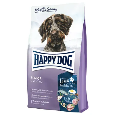Hundfoderpåse med texten Happy Dog, Senior, 11 kg+, fit & vital. Synlig hundillustration och märkning: Mehr Vitalität durch L-Carnitin, Unterstützt das Immunsystem, Unterstützt die Gelenke.