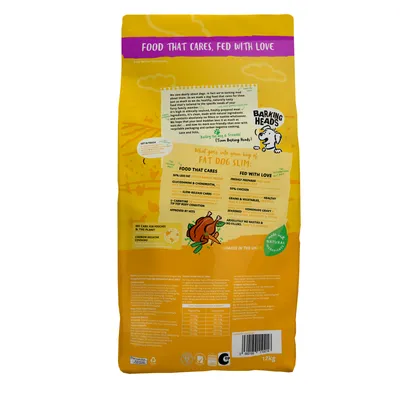 Back of pet food bag showing product features such as 30% less fat, slow-release carbs, L-carnitine, glucosamine, chondroitin, 50% chicken, grains, vegetables, and feeding guide table.