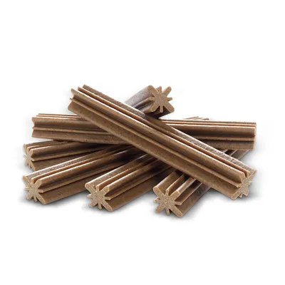 Several brown, star-shaped chew sticks stacked together.