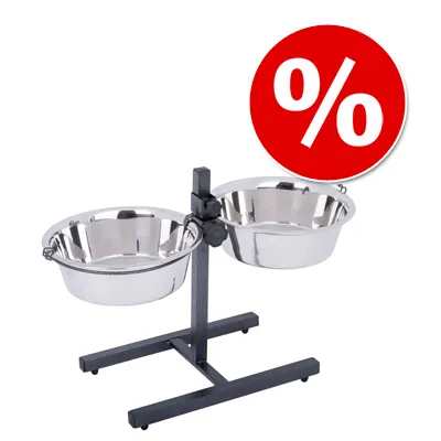 Soporte metálico con dos cuencos de acero inoxidable y símbolo de porcentaje en círculo rojo, indicando oferta o descuento visible.