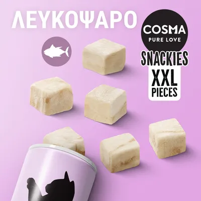 COSMA PURE LOVE SNACKIES XXL PIECES, λευκοψάρο, κύβοι λιχουδιάς για γάτες σε ροζ φόντο, συσκευασία με μαύρη σιλουέτα γάτας ορατή.