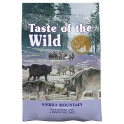 Confezione di crocchette Taste of the Wild Sierra Mountain, testo visibile: 'Taste of the Wild', 'Sierra Mountain', illustrazione con lupi e paesaggio boschivo.