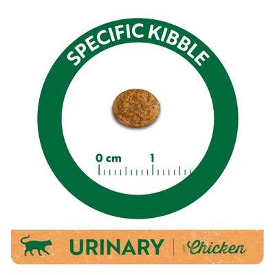 Kerek táp szemcse méretábrával 0–1 cm-ig, zöld körben 'SPECIFIC KIBBLE' felirattal. Alul: URINARY with Chicken.