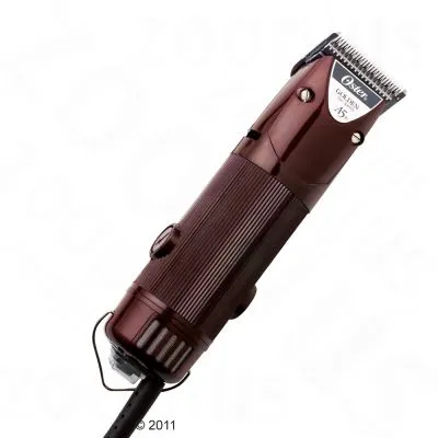 Oster Golden A5 elektrisk klippemaskine med metalblad og brun plastkrop, synlig ledning. Produktnavn: Oster Golden A5.