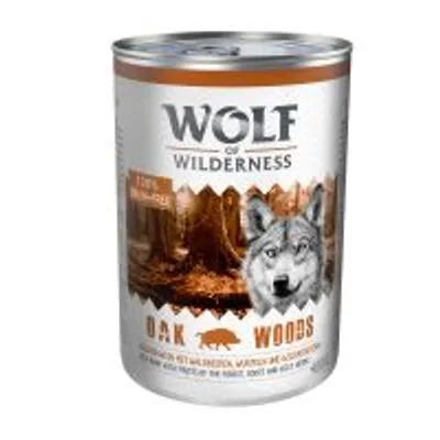 Wolf of Wilderness Oak Woods, lattina con immagine di foresta e cinghiale, testo visibile: 100% selvaggina.
