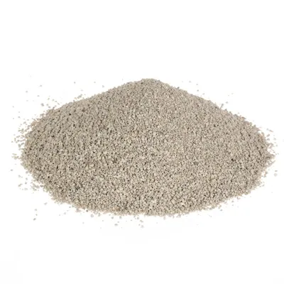 Pile of fine, light grey granules displayed on a white background, showing the texture and consistency of the product.