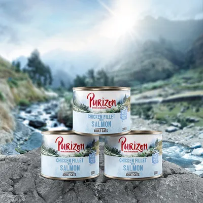Three tins of Purizon Chicken Fillet with Salmon for adult cats, 200g each. Label shows '45% chicken fillet'. Mountain stream background visible on packaging.
