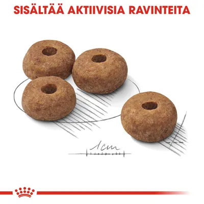 Neljä rengasmaista kuivaruokanappulaa, halkaisija noin 1 cm. Yläreunassa teksti: SISÄLTÄÄ AKTIIVISIA RAVINTEITA.