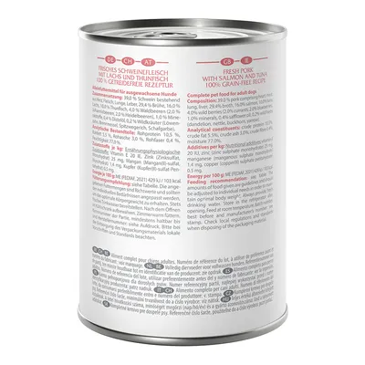 Dose mit der Aufschrift: Frisches Schweinefleisch mit Lachs und Thunfisch, 100% getreidefreie Rezeptur. Zusammensetzung, analytische Bestandteile und Fütterungsempfehlung für Hunde sichtbar.
