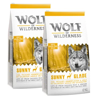 Wolf of Wilderness Sunny Glade, 12 kg, 100% grain-free recipe. Paljon tuoretta kananlihaa ja riistaa, metsämarjoja, juuria ja villiyrttejä. Näkyvissä englannin- ja saksankielistä tekstiä.