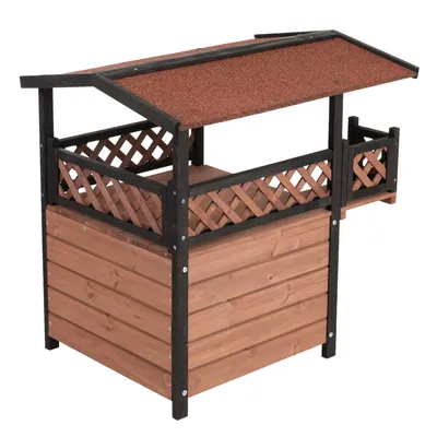 Niche ou maisonnette en bois avec toit incliné, panneaux latéraux à croisillons et terrasse surélevée. Structure en bois naturel et noir, toit recouvert de matériau brun.