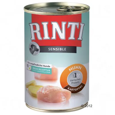 RINTI Sensible Huhn Kartoffel, per cani sensibili. Testo in tedesco: 'Für empfindliche Hunde', 'Neue Rezeptur', 'Nr. 1 tierisches Protein'. Immagine di pollo e patate.