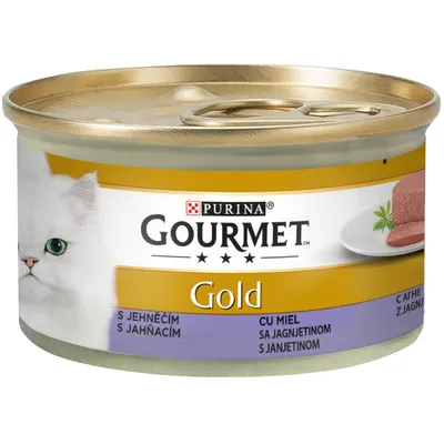 Purina Gourmet Gold kattmatsburk med lamm smak, gyllene förpackning, bild av en vit katt och ett serveringsförslag.