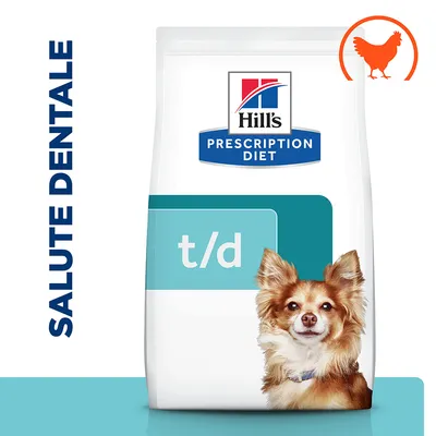 Confezione Hill's Prescription Diet t/d, scritta 'SALUTE DENTALE' a sinistra, simbolo pollo in alto a destra, immagine di cane sulla confezione.