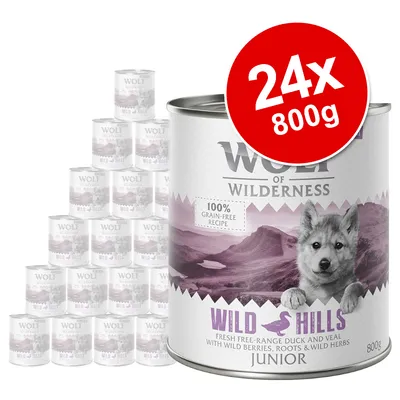 Pack of 24 cans, each 800g, labelled as 100% grain-free recipe with fresh free-range duck and veal, wild berries, roots and wild herbs. Product name: Wild Hills Junior. Pack of 24 cans, each 800g, labelled as 100% grain-free recipe with fresh free-range duck and veal, wild berries, roots and wild herbs. Product name: Wild Hills Junior.
