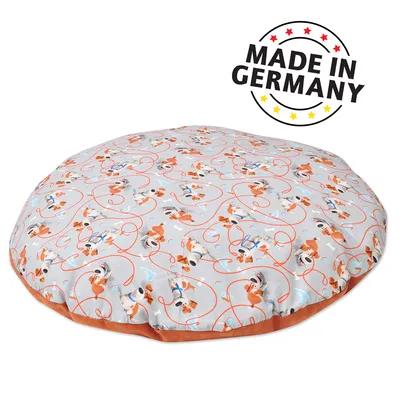 Coussin rond pour animaux motif chiens, tissu imprimé, texte visible : MADE IN GERMANY.