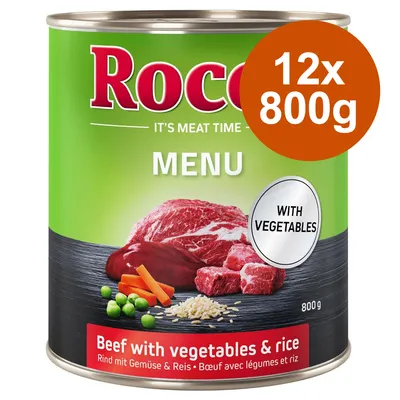 Rocco Menu, Rind mit Gemüse und Reis, 12x800g. Dose zeigt Fleischstück, Karotten, Erbsen und Reis. Text: 'With vegetables'. Rocco Menu, Rind mit Gemüse und Reis, 12x800g. Dose zeigt Fleischstück, Karotten, Erbsen und Reis. Text: 'With vegetables'.