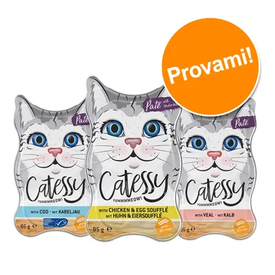 Catessy Yummmmeow! Paté per gatti, 3 confezioni da 85 g: con merluzzo, con pollo e soufflé d’uovo, con vitello. Etichetta arancione con testo: Provami!