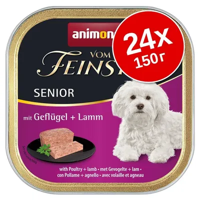 animonda Vom Feinsten Senior, 24x150 г, с птиче и агнешко. Изображение на бяло куче и парчета пастет върху черна чиния. Видим текст: mit Geflügel + Lamm.