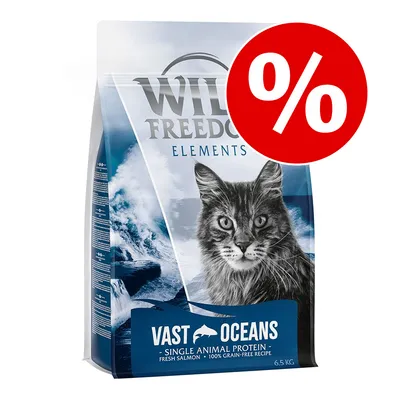 Pachet Wild Freedom Elements Vast Oceans pentru pisici, 6,5 kg, text vizibil: Single Animal Protein, Fresh Salmon, 100% Grain-Free Recipe; simbol procent roșu pentru promoție.
