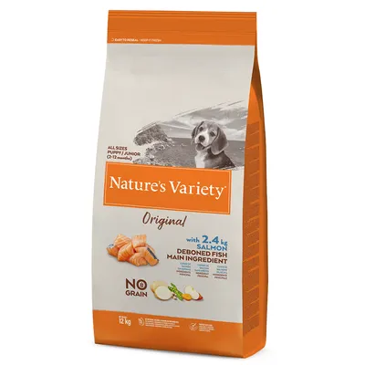 Nature’s Variety Original hundefoder, 12 kg pose. Tekst: All sizes puppy/junior (2–12 months), with 2.4 kg salmon deboned fish main ingredient, no grain. Billede af laks og grøntsager.