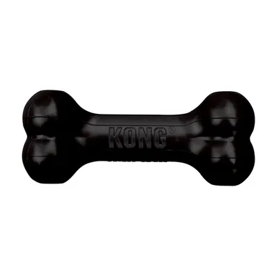 Jouet en forme d’os noir avec inscription KONG, matériau plastique visible.