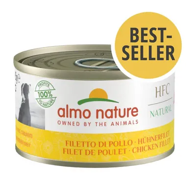 Lata de Almo Nature HFC Natural, filete de pollo. Texto visible: 'PROFITS 100% TO NATURE', 'BEST-SELLER', 'OWNED BY THE ANIMALS', 'CHICKEN FILLET'. Lata de Almo Nature HFC Natural, filete de pollo. Texto visible: 'PROFITS 100% TO NATURE', 'BEST-SELLER', 'OWNED BY THE ANIMALS', 'CHICKEN FILLET'.