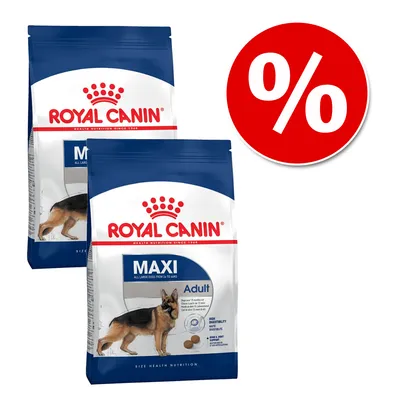 Dwie torby karmy Royal Canin Maxi Adult z widocznym psem rasy owczarek niemiecki oraz czerwone koło z symbolem procenta, oznaczające promocję lub ofertę specjalną.