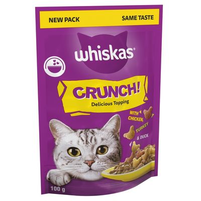 Three Whiskas treat packs displayed: Dentabites with Chicken, Temptations, and Crunch Delicious Topping. Each pack shows product name, flavour, weight, and key features.