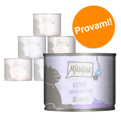 Confezione di lattine MjAMjAM Kitten Vorzügliches Kalb, scritta 'Provami!' su cerchio arancione, etichetta con disegno di gatto e simbolo senza cereali visibili.