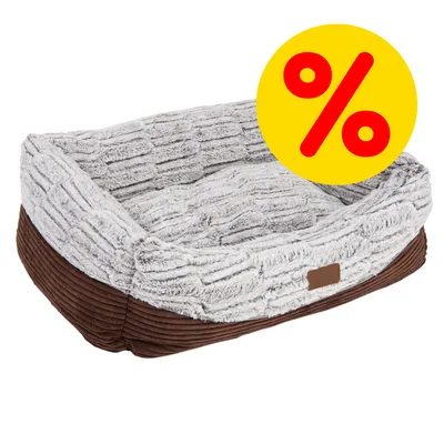Cuccia rettangolare in tessuto grigio e marrone, simbolo giallo con percentuale rossa che indica offerta o sconto visibile sull'immagine.