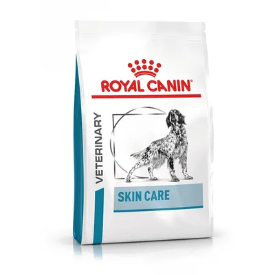 Saco de comida para perros Royal Canin Veterinary Skin Care. Texto visible: VETERINARY, SKIN CARE. Imagen de un perro en el envase.