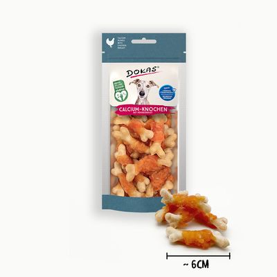 Dokas кальциевая кость с куриной грудкой, сертифицировано по стандарту благополучия животных, проверено SGS Institut Fresenius. Упаковка с костью и куриным мясом.