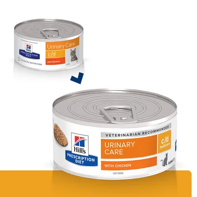 Boîte de nourriture pour chat Hill's Prescription Diet Urinary Care c/d Multicare with Chicken, étiquette orange et blanche, image d’un chat et croquettes visibles sur l’emballage. Boîte de nourriture pour chat Hill's Prescription Diet Urinary Care c/d Multicare with Chicken, étiquette orange et blanche, image d’un chat et croquettes visibles sur l’emballage.